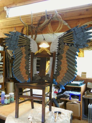 Chair seems to disappear into the wings. 