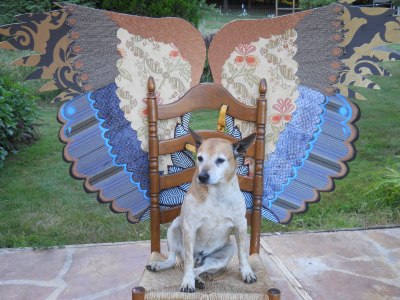 Hank likes the ladderback chair. It's fussy turned rungs seem to go well with the embroidered brocade.